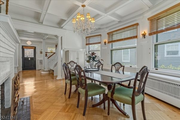 Chandelier, Dining room, Fireplace, Interior, Wood Texture Flooring