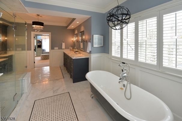 Bathroom, Chandelier, Dual Sink Vanities, Free Standing Baths, Glass Shower, Interior, Marble, Pendant Lights, Recessed Lighting