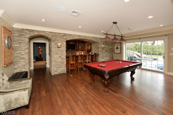 Billiard Table, Game Room, Interior, Pendant Lights, Recessed Lighting, Stone Walls, Wood Texture Flooring