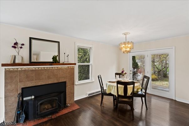 Chandelier, Dining room, Fireplace, Interior, Wood Texture Flooring