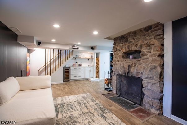 Fireplace, Interior, Recessed Lighting, Stone Walls, Wood Texture Flooring