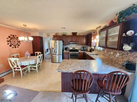 Chandelier, Dining room, Interior, Kitchen, Pendant Lights, Stainless Steel Appliances