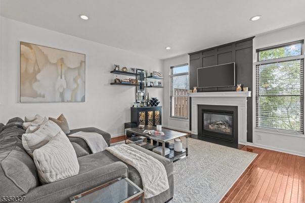 Fireplace, Interior, Living room, Recessed Lighting, Wood Texture Flooring