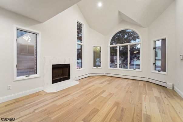 Empty room, Fireplace, Interior, Recessed Lighting, Wood Texture Flooring