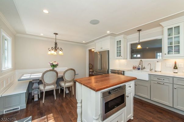 Dining room, Interior, Kitchen, Pendant Lights, Recessed Lighting, Stainless Steel Appliances, Wood Texture Flooring