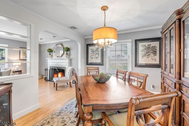 Chandelier, Dining room, Fireplace, Interior, Wood Texture Flooring