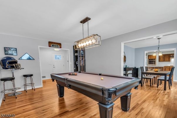 Billiard Table, Dining room, Game Room, Interior, Pendant Lights, Wood Texture Flooring