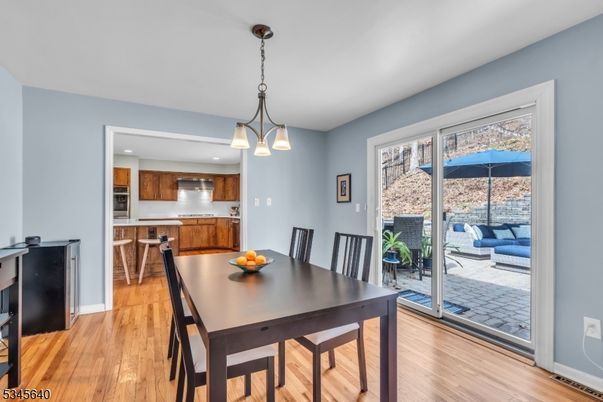 Chandelier, Dining room, Interior, Kitchen, Pendant Lights, Recessed Lighting, Wood Texture Flooring