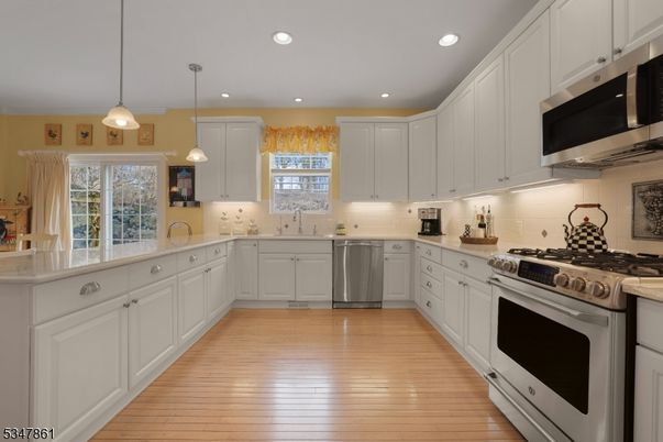 Interior, Kitchen, Pendant Lights, Recessed Lighting, Stainless Steel Appliances, Wood Texture Flooring
