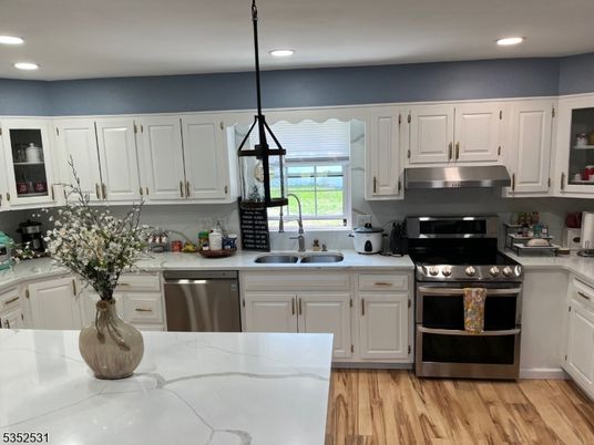 Interior, Kitchen, Pendant Lights, Recessed Lighting, Stainless Steel Appliances, Wood Texture Flooring