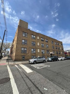 Exterior, Facade, Brick Facade, Condo Building