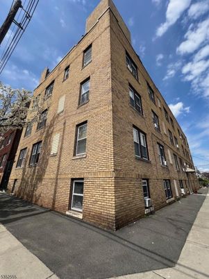 Exterior, Facade, Brick Facade, Condo Building