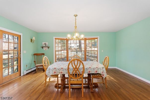Chandelier, Dining room, Interior, Wood Texture Flooring