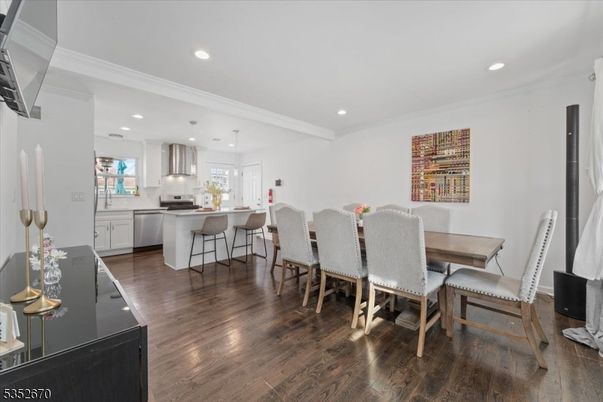 Dining room, Interior, Kitchen, Pendant Lights, Recessed Lighting, Stainless Steel Appliances, Wood Texture Flooring