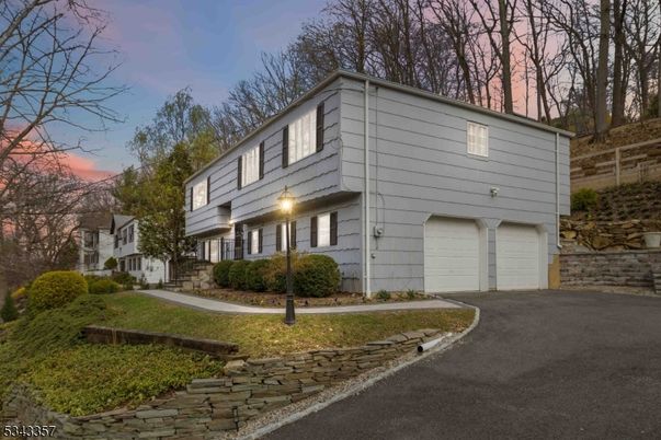 Attached, Exterior, Facade, Raised Ranch