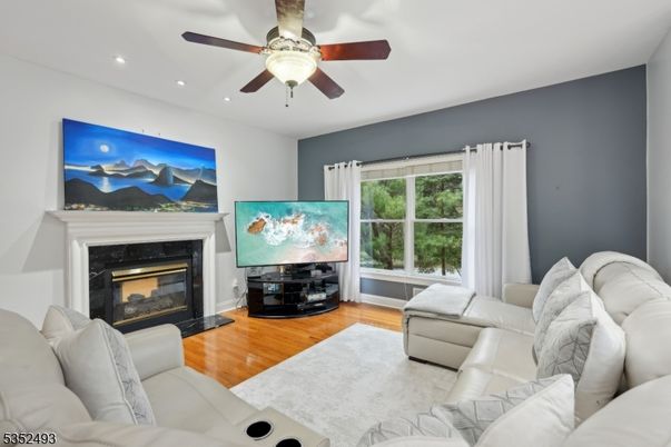 Fireplace, Interior, Living room, Recessed Lighting, Wood Texture Flooring