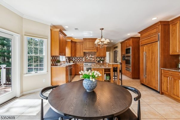 Chandelier, Dining room, Interior, Kitchen, Recessed Lighting, Stainless Steel Appliances