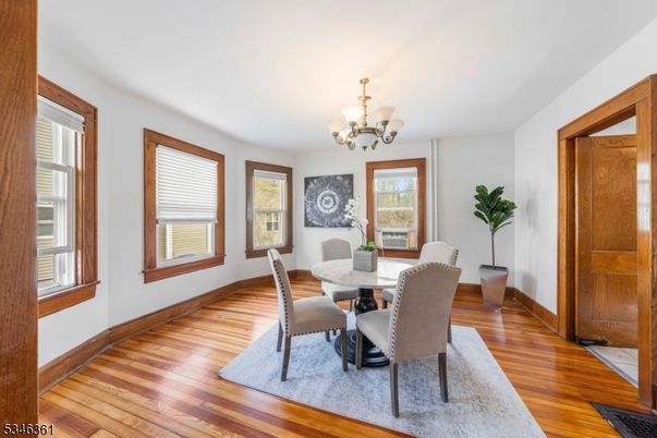 Chandelier, Dining room, Interior, Wood Texture Flooring