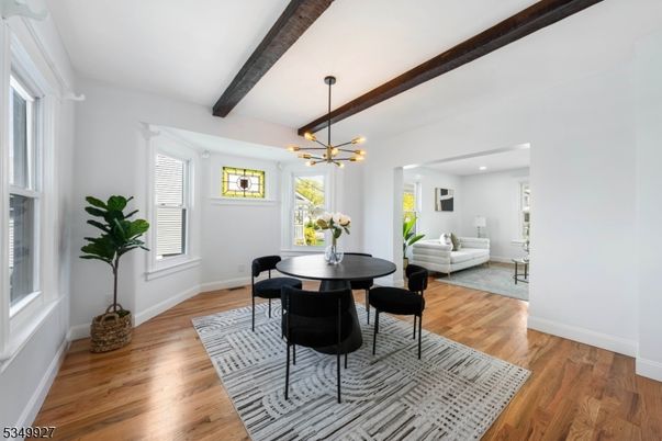 Dining room, Interior, Living room, Pendant Lights, Recessed Lighting, Wooden Beams, Wood Texture Flooring