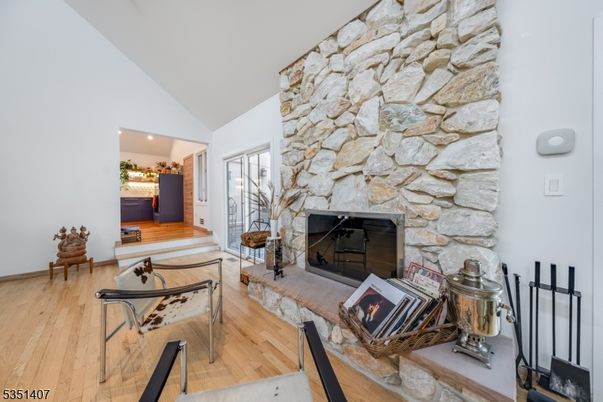 Fireplace, Interior, Recessed Lighting, Stone Walls, Wood Texture Flooring