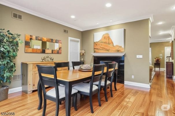 Dining room, Fireplace, Interior, Recessed Lighting, Wood Texture Flooring