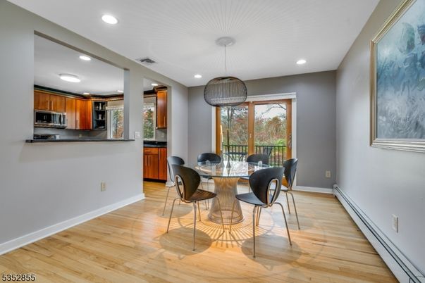 Dining room, Interior, Kitchen, Recessed Lighting, Stainless Steel Appliances, Wood Texture Flooring