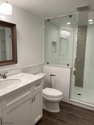 Bathroom, Glass Shower, Interior, Recessed Lighting, Wood Texture Flooring