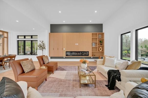 Dining room, Fireplace, Interior, Living room, Recessed Lighting, Wood Texture Flooring
