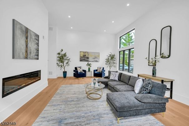 Fireplace, Interior, Living room, Recessed Lighting, Wood Texture Flooring