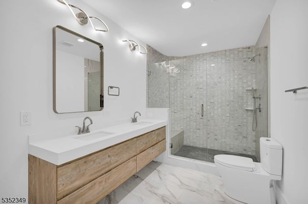 Bathroom, Dual Sink Vanities, Glass Shower, Interior, Marble, Recessed Lighting