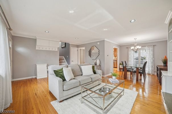 Chandelier, Dining room, Interior, Living room, Recessed Lighting, Wood Texture Flooring