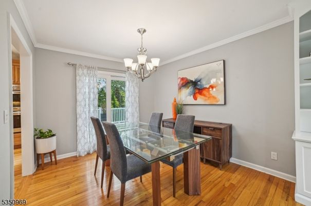 Chandelier, Dining room, Interior, Wood Texture Flooring