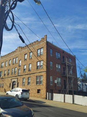 Exterior, Facade, Brick Facade, Condo Building