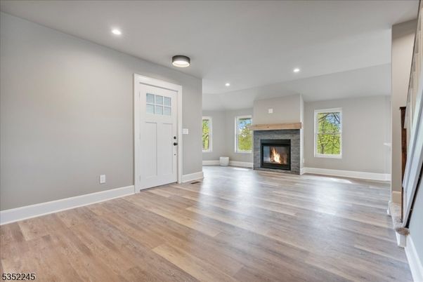 Empty room, Fireplace, Interior, Recessed Lighting, Wood Texture Flooring