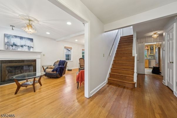 Chandelier, Fireplace, Interior, Recessed Lighting, Wood Texture Flooring