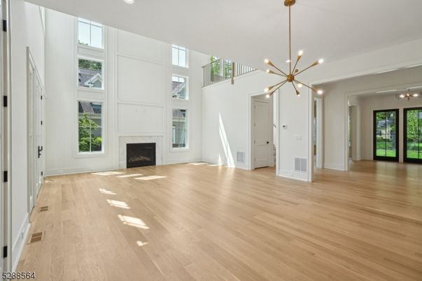 Empty room, Fireplace, Interior, Pendant Lights, Wood Texture Flooring