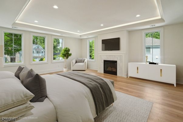 Bedroom, Fireplace, Interior, Recessed Lighting, Wood Texture Flooring