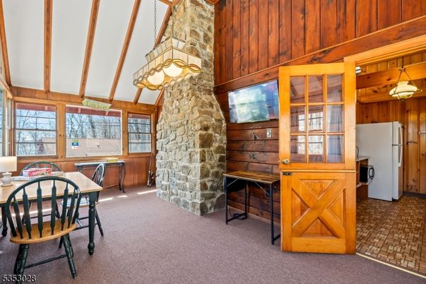 Dining room, Fireplace, Interior, Pendant Lights, Stone Walls, Wooden Walls