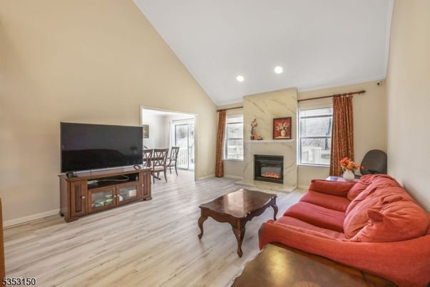 Fireplace, Interior, Living room, Recessed Lighting, Wood Texture Flooring