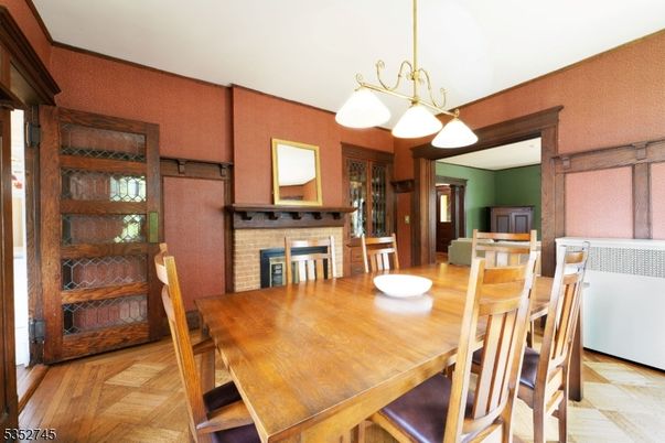Chandelier, Dining room, Fireplace, Interior, Wood Texture Flooring
