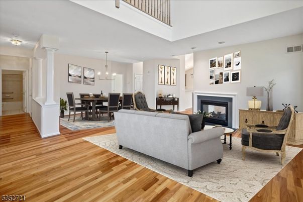 Dining room, Fireplace, Interior, Living room, Pendant Lights, Wood Texture Flooring