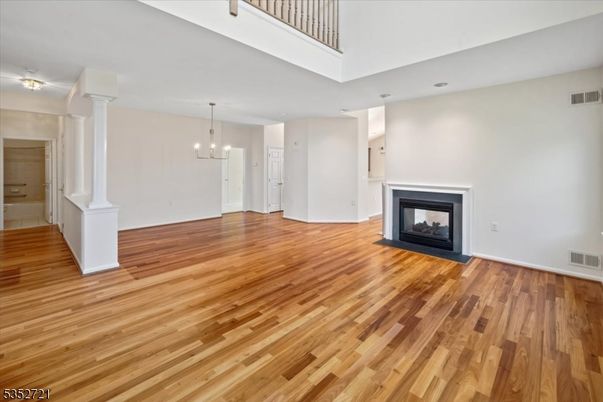 Empty room, Fireplace, Interior, Pendant Lights, Wood Texture Flooring