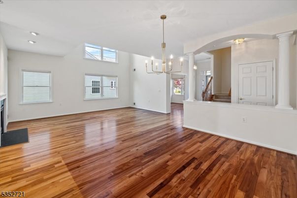 Chandelier, Empty room, Interior, Recessed Lighting, Wood Texture Flooring
