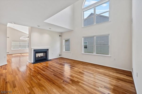 Empty room, Fireplace, Interior, Recessed Lighting, Wood Texture Flooring