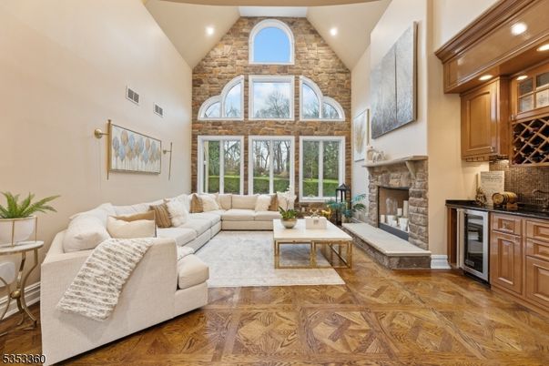 Fireplace, Interior, Living room, Recessed Lighting, Stone Walls, Wood Texture Flooring