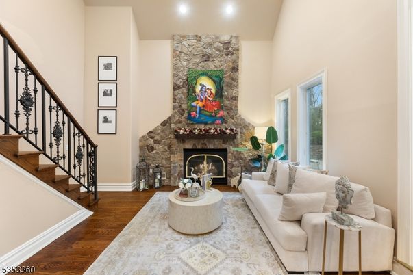 Fireplace, Interior, Living room, Recessed Lighting, Stone Walls, Wood Texture Flooring