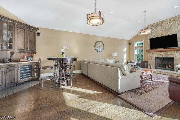 Fireplace, Interior, Living room, Pendant Lights, Recessed Lighting, Stone Walls, Wood Texture Flooring