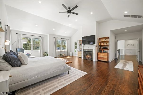 Bedroom, Fireplace, Interior, Recessed Lighting, Wood Texture Flooring