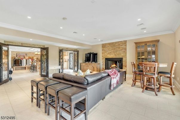 Dining room, Fireplace, Interior, Living room, Recessed Lighting, Stone Walls