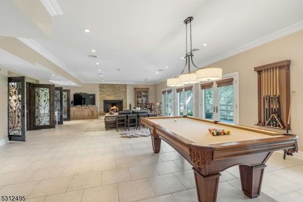 Billiard Table, Chandelier, Fireplace, Game Room, Interior, Recessed Lighting, Stone Walls